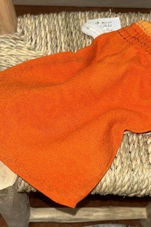 Manopla exfoliante para el baño